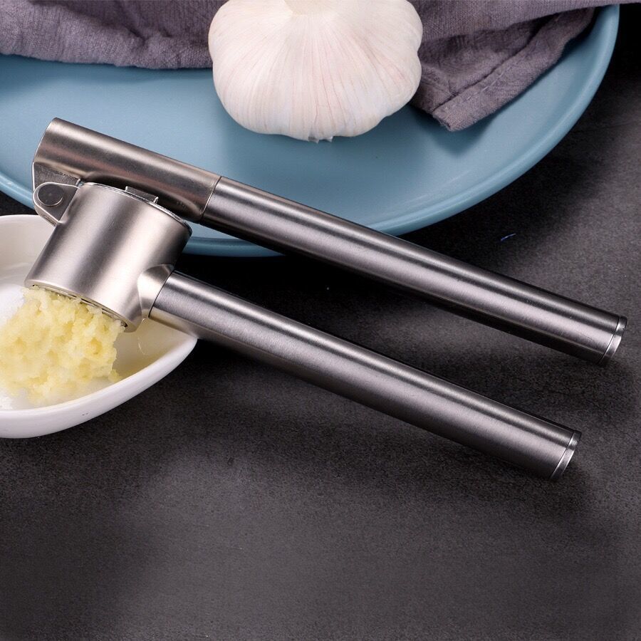 Kitchen Garlic Press with Soft;  Easy to Squeeze Ergonomic Handle - Garlic Mincer Tool with Sturdy Design Extracts More Garlic Paste - Easy to Clean Garlic Crusher and Ginger Press (Silver)